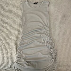 Green ruched mini dress